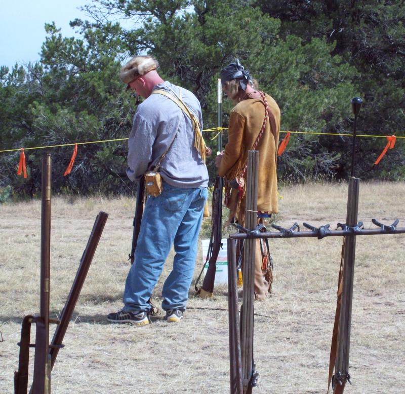 Father and Son Enjoy Shooting on the Fire Line